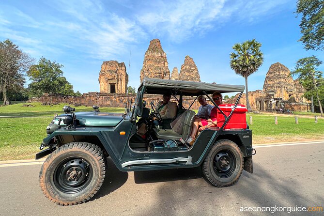 Angkor Wat Sunrise and Market Tour by Jeep - Angkor Thom circuit: Bayon, elephant terrace, and the ghost gate
