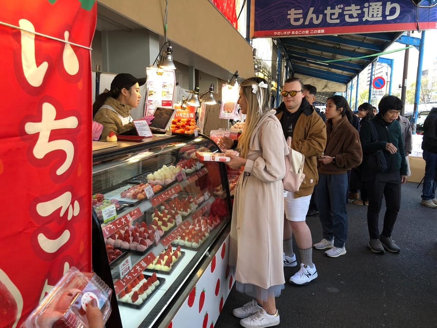 Dive into Tsukiji Fish Market Walking Friendly Food Tour - Start at Tsukiji Hongwanji Temple for a steadier beginning