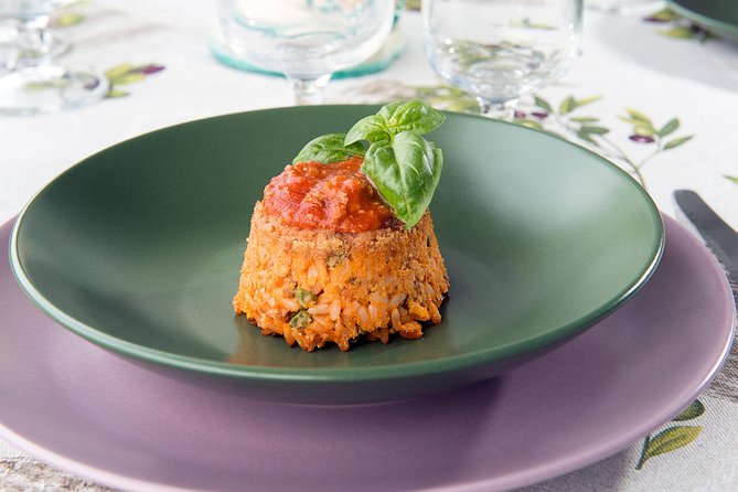 Market tour and lunch or dinner at a local's home in Siracusa - Food shops and sampling: spices, seafood, and the flavor logic of Sicily