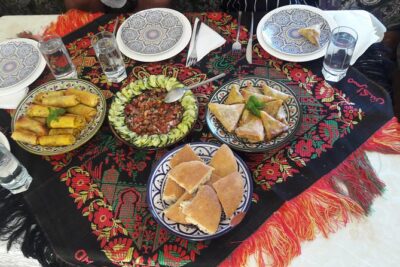 Moroccan Cooking Class & Marrakech Market Visit with Chef Khmisa - Khmisa Workshops: Mint Tea and the Moroccan Kitchen Rhythm