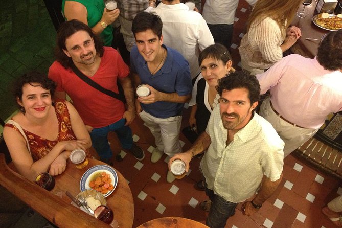 Seville Off the Beaten Path Tapas and Market Tour - Your walking route: plazas, columns, and night-lit Seville