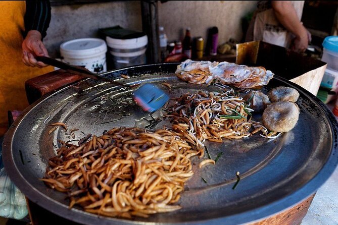 Siem Reap Authentic Breakfast and Market Tour - Stop 2: Psar Chaa old market and kuy teo kat
