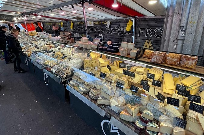 Sunday morning Eiffel Tower Food Market Tour -Max 8 people - Stop 2: Marche Grenelle tastings (charcuterie, duck, cheese, macarons)
