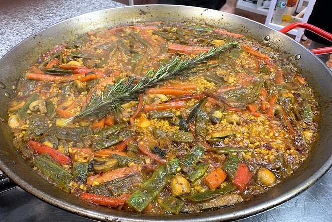 Vegetable Paella cooking class, tapas and Ruzafa market visit - What you actually eat: a full Valencian spread, not just the main dish